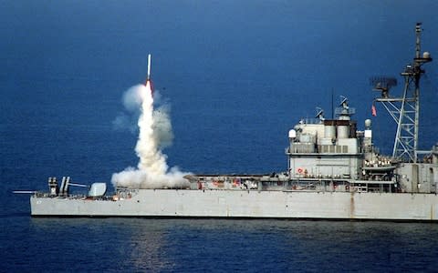 A Tomahawk cruise missile being launched from the USS Shiloh to attack targets in Iraq in 1996