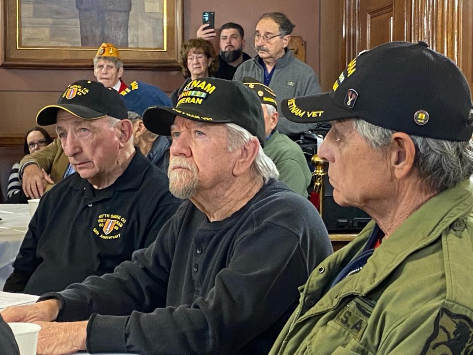 Serious faces of Vietnam vets reflect the solemnity of the occasion at the Rhode Island State House ceremony marking Vietnam Veterans Day.