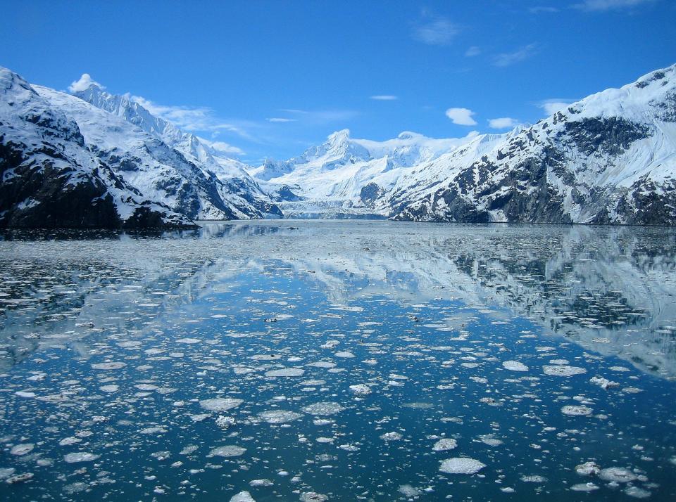 Chunks of ice are seen in the water near Johns Hopkins Glacier at Glacier Bay National Park and Preserve.