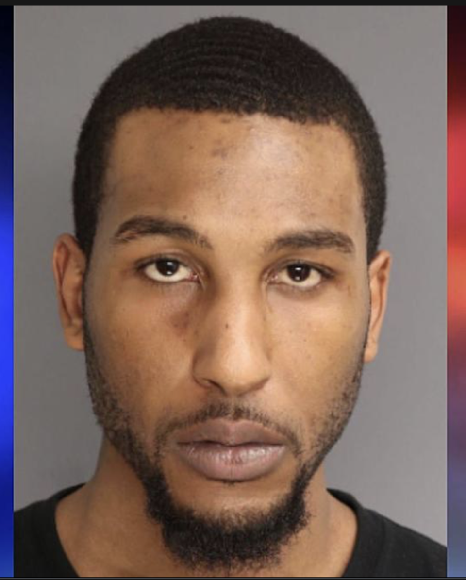 Kendall Howard, 30, of East Orange, New Jersey, has been named as a suspect in the shooting of two police officers (Essex County Jail)