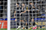 Real Madrid's Arda Guler celebrates after scoring his side's opening goal during the Spanish La Liga soccer match between Real Sociedad and Real Madrid in San Sebastian, Spain, Friday, April 26, 2024. (AP Photo/Alvaro Barrientos)