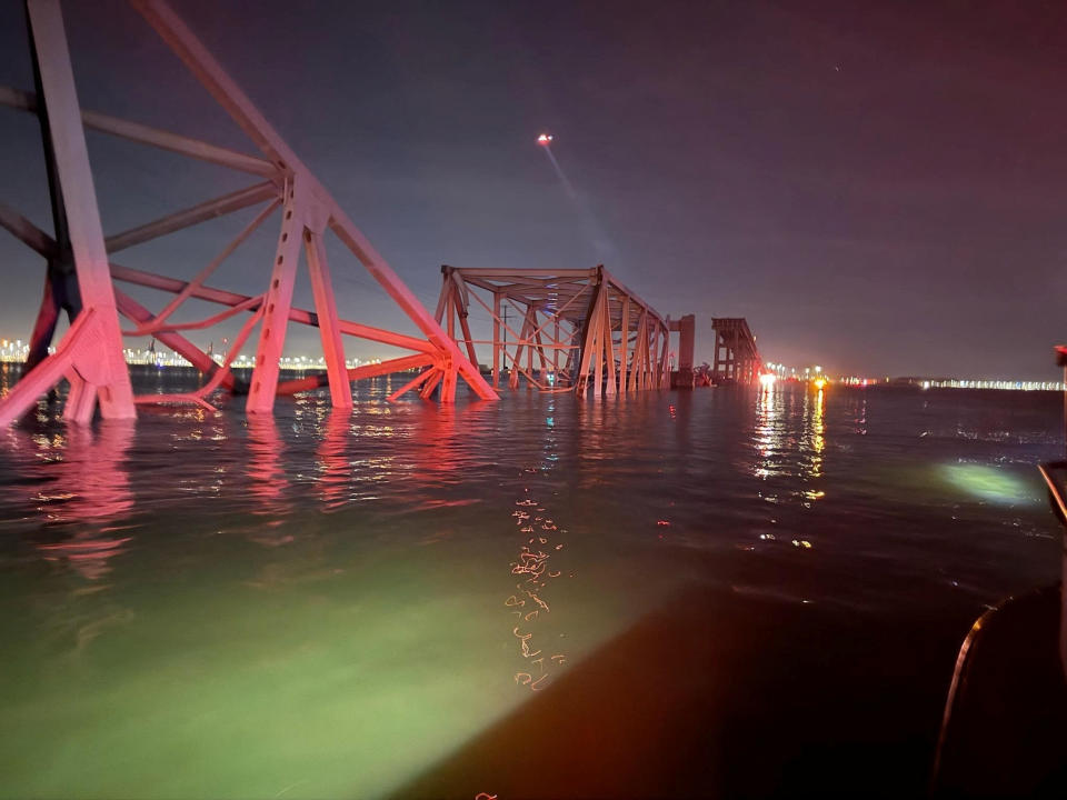 A view of the Dali cargo vessel which crashed into the Francis Scott Key Bridge causing it to collapse in Baltimore, Maryland, U.S., March 26, 2024.  BALTIMORE CITY FIRE DEPARTMENT RESCUE COMPANY/Handout via REUTERS