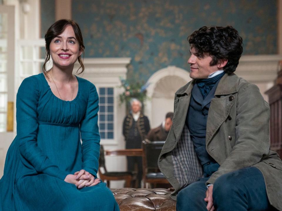 (Left to right) Dakota Johnson as Anne Elliot, Edward Bluemel as Captain Harville in Persuasion. (Nick Wall/Netflix)