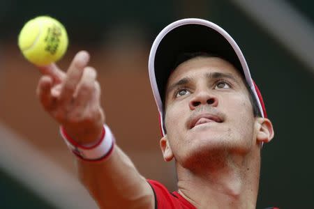 Tennis - French Open - Roland Garros - Rafael Nadal of Spain vs Facundo Bagnis of Argentina. - Paris, France - 26/05/16. Facundo Bagnis serves. REUTERS/Pascal Rossignol