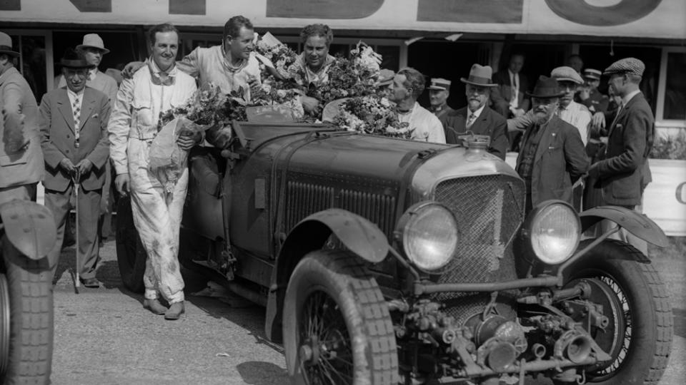 "Bentley Boys" Glen Kidston and Woolf Barnato sit in their Bentley Speed Six after winning the 24 Hours of Le Mans in 1930.
