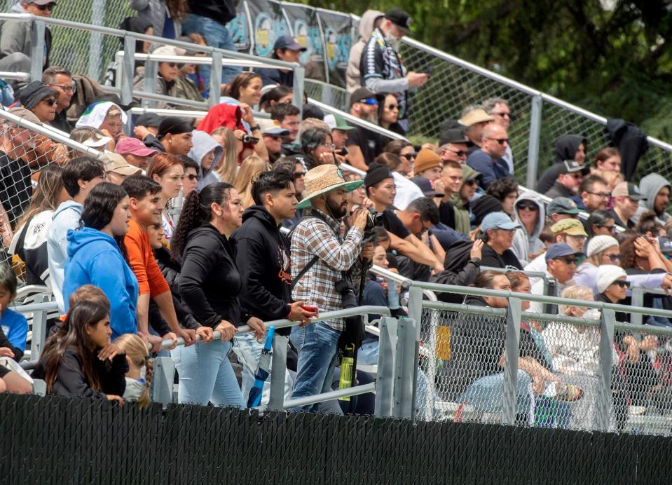 Soccer fans watch the inaugural USL W League game between the Stockton Cargo and the Oakland Soul at the San Joaquin Delta College soccer field in Stockton on Saturday, May, 6, 2023.