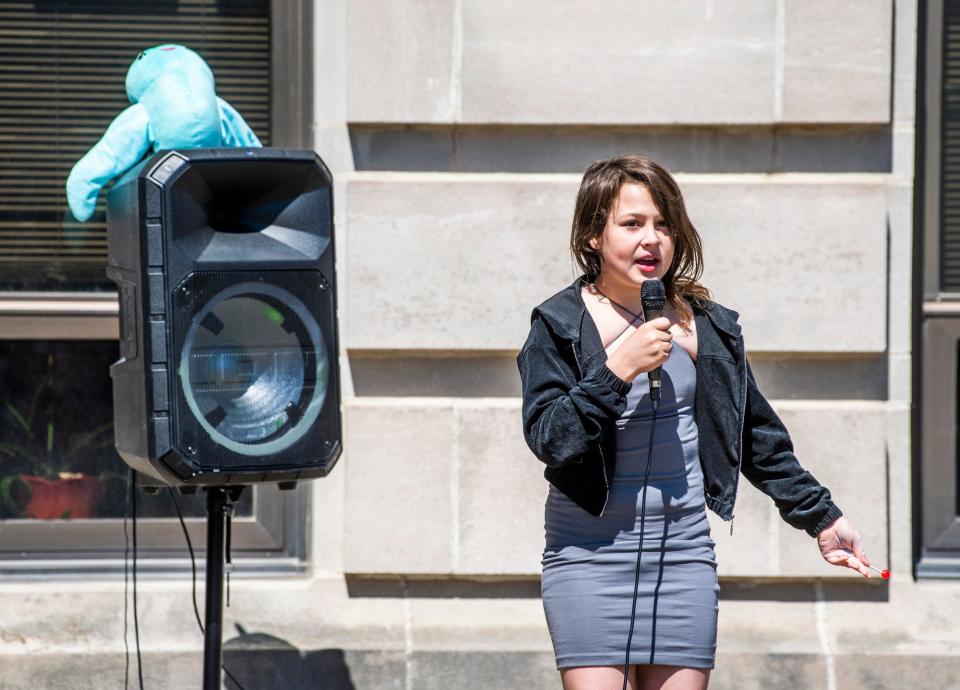 Kirin Clawson speaks during the "End hate, elevate and celebrate trans joy" demonstration at the Monroe County Courthouse last April.