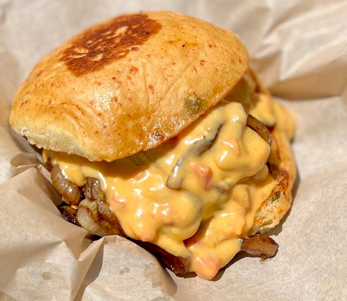 A Hatch chile queso burger at JD’s Hamburgers.