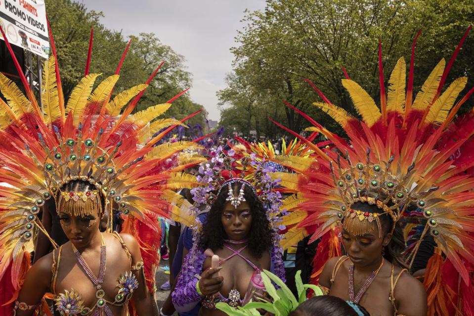 Dancers participate in the West Indian Day Parade, Monday, Sept. 4, 2023, in the Brooklyn borough of New York. The largest U.S. celebration of Caribbean culture is held in New York City, as steel bands, floats and flamboyantly costumed revelers take to the streets in the West Indian Day parade. (AP Photo/Yuki Iwamura)