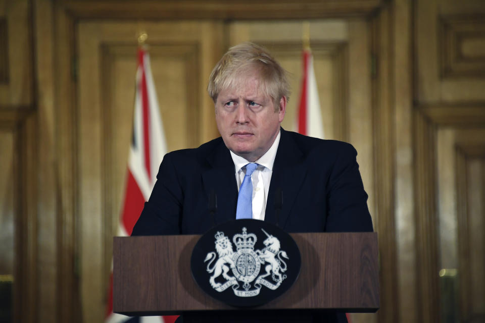 Britain's Prime Minister Boris Johnson speaks during a press conference about coronavirus in 10 Downing Street in London, Monday, March 9, 2020. (AP Photo/Alberto Pezzali)