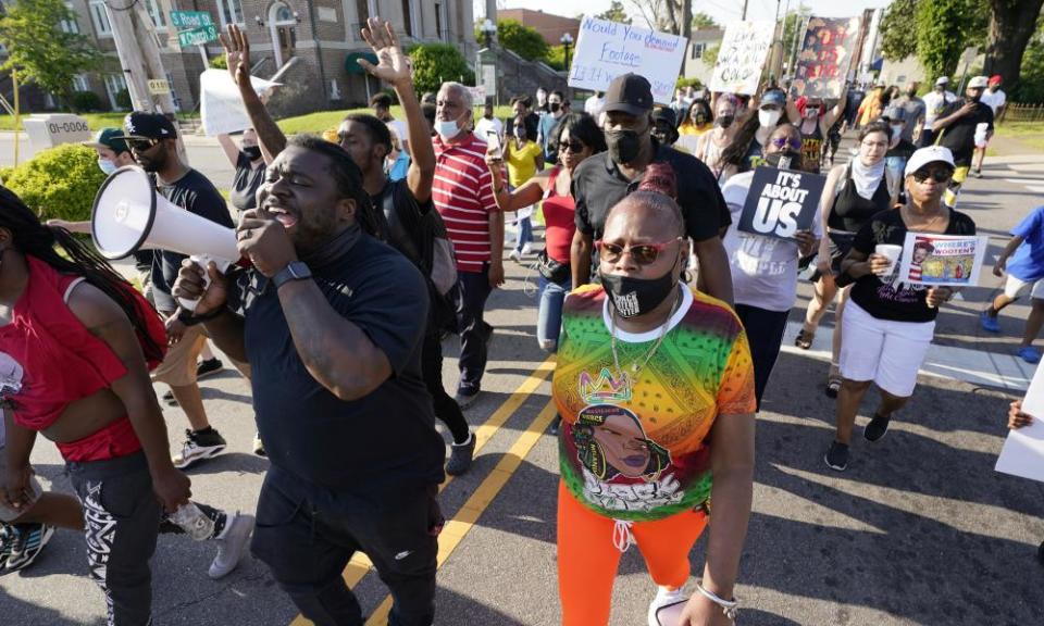 Protesters march to demand justice for Andrew Brown.