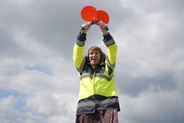 Angela Rayner helps marshal an easyJet plane at London Stansted airport