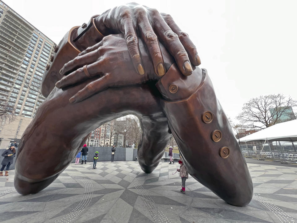 Photo by: GWR/STAR MAX/IPx 2023 1/15/23 The Embrace, a new statue designed by Hank Willis Thomas and set in Boston represents a photo of Martin Luther King, Jr. and his wife Coretta Scott King embracing in a photo. It is in the Boston Commons and was just unveiled on Friday. Bostonians came out over the weekend to visit it.