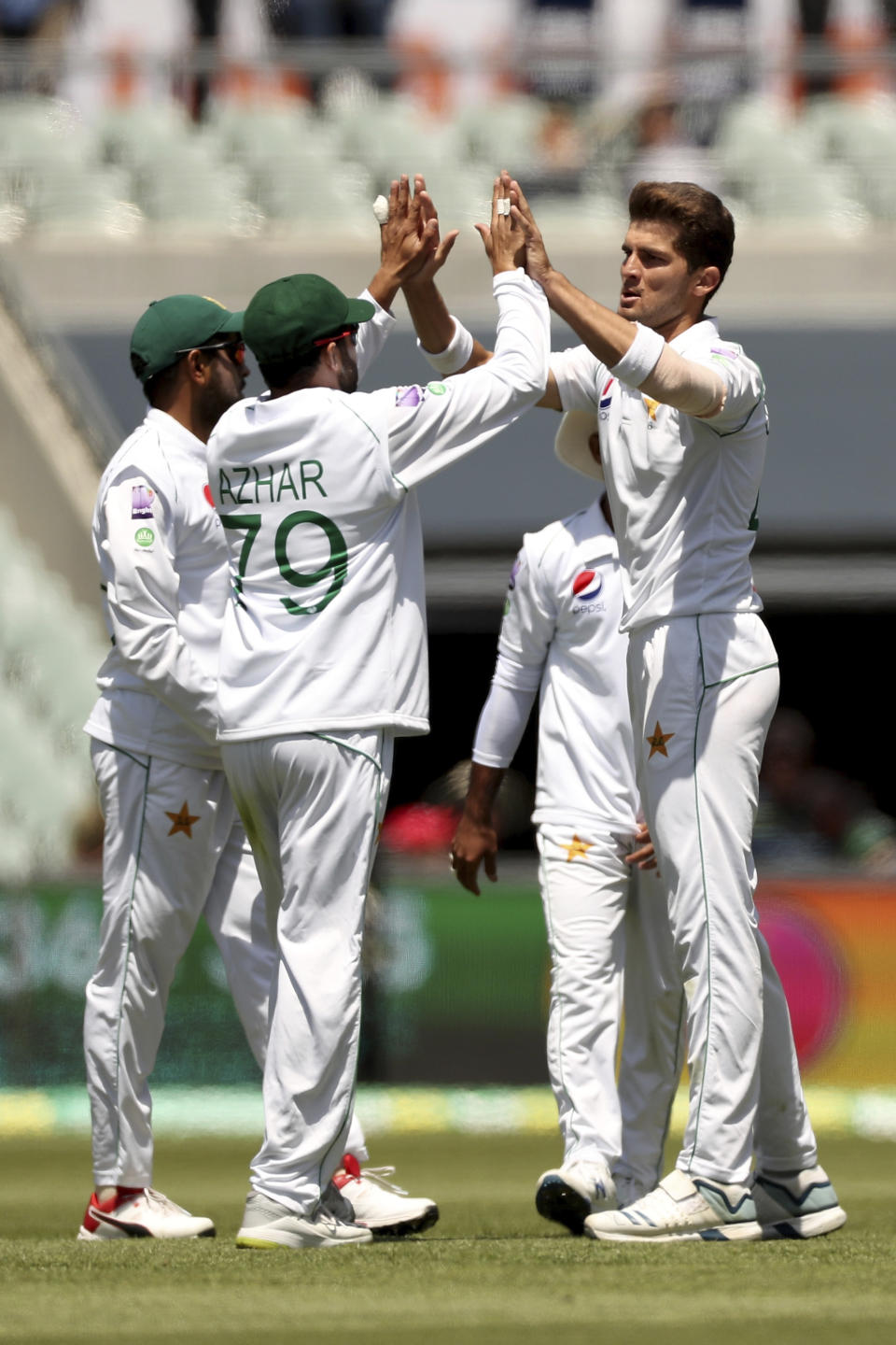 Pakistan's Shaheen Afridi celebrates the wicket of Australia's Marnus Labuschagne is bowled during their cricket test match in Adelaide, Saturday, Nov. 30, 2019. (AP Photo/James Elsby)