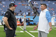 Atlanta Falcons head coach Arthur Smith, left, talks with Tennessee Titans head coach Mike Mike Vrabel before an NFL football game, Sunday, Oct. 29, 2023, in Nashville, Tenn. (AP Photo/George Walker IV)