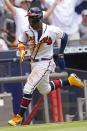 Atlanta Braves/ Ronald Acuna Jr. (13) runs home to score on an Ozzie Albies' base hit in the sixth inning of a baseball game against the Washington Nationals, Thursday, June 3, 2021, in Atlanta. (AP Photo/John Bazemore)