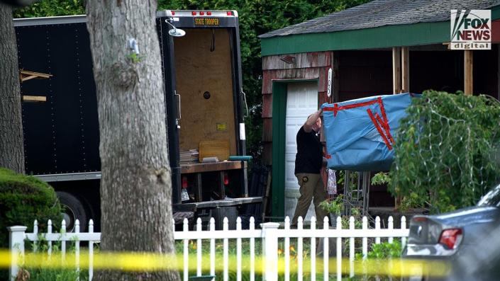 New York State Police remove evidence from the home of Rex Heuermann in Massapequa Park, NY, Saturday, July 15, 2023. Heuermann is charged with six counts of murder related to the bodies found on Gilgo Beach in 2010-2011.