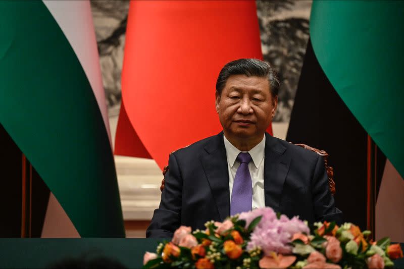 China's President Xi Jinping and Palestinian President Abbas attend a signing ceremony at the Great Hall of the People in Beijing