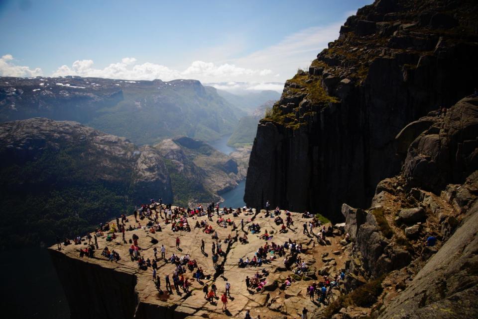 According to NWF: Like many visitors to Norway, Mary Hall and her family felt drawn to make the arduous trek to Pulpit Rock, hiking for several hours to reach this remarkable table of stone nearly 2,000 feet above the winding waters of Lysefjord. “I’m not afraid of heights,” says Hall, who dangled her feet over the edge while absorbing the view. Hoping for a different perspective, her family hiked higher still, and Hall made this image from above. “What I love about this shot,” she says, “is how all those people are having fun just enjoying the gorgeous scenery. The rock, the water, the clouds — it was just serene.” MARY HALL, 2020 National Wildlife® Photo Contest