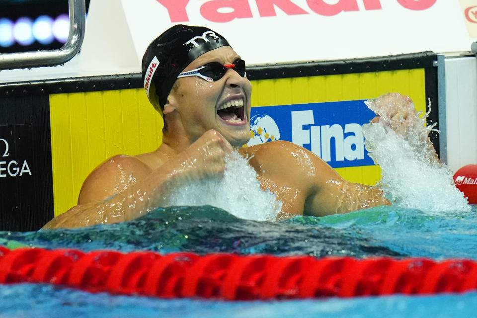 Justin Ress of the United States celebrates winning the men's 50m backstroke final at the 19th FINA World Championships in Budapest, Hungary, Saturday, June 25, 2022. (AP Photo/Petr David Josek)