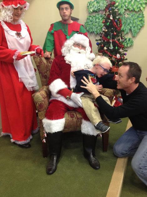 <div class="caption-credit"> Photo by: Kimberly D. Taylor</div><p> "Jude does what he wants and lets you know when he doesn't like something. Santa came to visit Jude at his school, which is geared toward children with visual impairments. We knew that Jude wouldn't care for sitting in Santa's lap, but we decided to go ahead and try... you see the end result." - Kimberly D. Taylor, <a href="http://voices.yahoo.com/reluctant-sit-santas-lap-11919823.html?cat=25" data-ylk="slk:Reluctant to Sit on Santa's Lap;elm:context_link;itc:0;sec:content-canvas;outcm:mb_qualified_link;_E:mb_qualified_link;ct:story;" class="link  yahoo-link">Reluctant to Sit on Santa's Lap</a> </p>