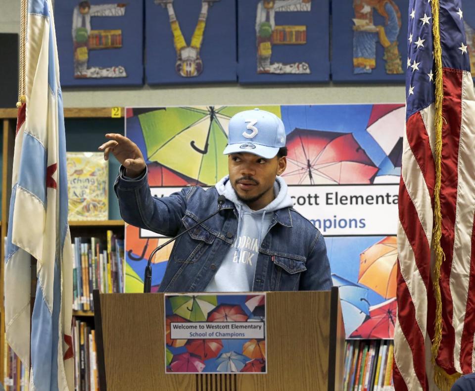 Chance The Rapper announces a gift of $1 million to the Chicago Public School Foundation during a news conference at the Westcott Elementary School, Monday, March 6, 2017, in Chicago. The Grammy-winning artist is calling on Illinois Gov. Bruce Rauner to use executive powers to better fund Chicago Public Schools. (AP Photo/Charles Rex Arbogast)