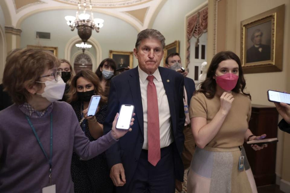 <div class="inline-image__title">1359569121</div> <div class="inline-image__caption"><p>Sen. Joe Manchin (D-WV) is followed by reporters as he leaves a caucus meeting with Senate Democrats.</p></div> <div class="inline-image__credit">Anna Moneymaker</div>