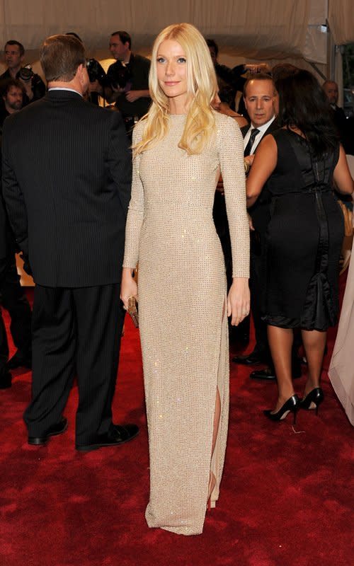 <p>Looking positively statuesque, Gwyneth Paltrow chose to wear a muted gold Stella McCartney gown with subtle split to the 2011 Met Ball.</p>