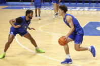 Kentucky's Davion Mintz, left, defends against Kellan Grady during an NCAA college basketball open house practice in Lexington, Ky., Monday, Oct. 11, 2021. (AP Photo/James Crisp)