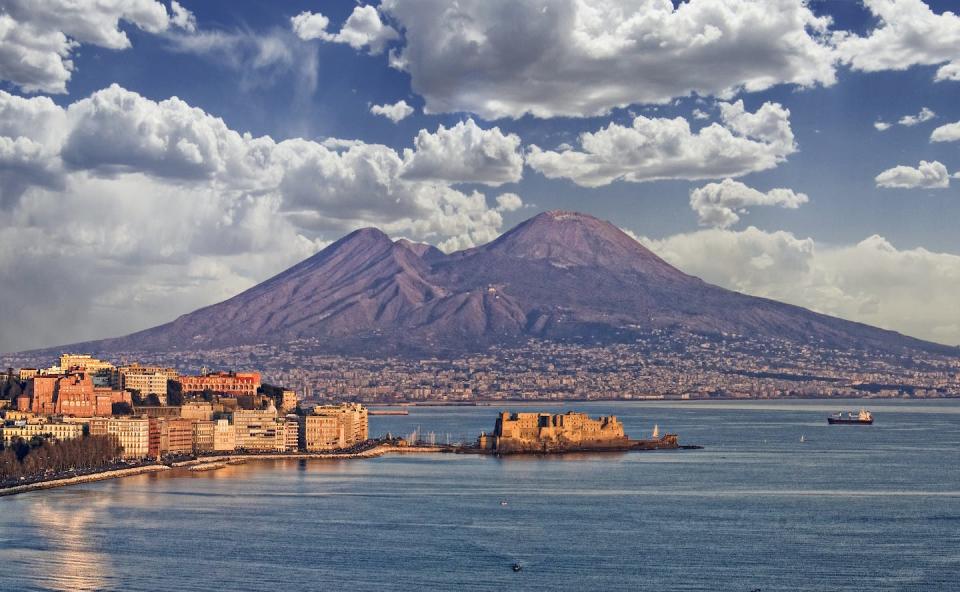 Mount Vesuvius, about 6 miles east of Naples, Italy, is still an active volcano. In A.D. 79, Vesuvius erupted and destroyed the city of Pompeii. <a href="https://www.gettyimages.com/detail/photo/travelling-in-italy-royalty-free-image/906204248?phrase=volcanoes%20mount%20vesuvius&adppopup=true" rel="nofollow noopener" target="_blank" data-ylk="slk:Antonio Busiello/Moment via Getty Images;elm:context_link;itc:0;sec:content-canvas" class="link ">Antonio Busiello/Moment via Getty Images</a>