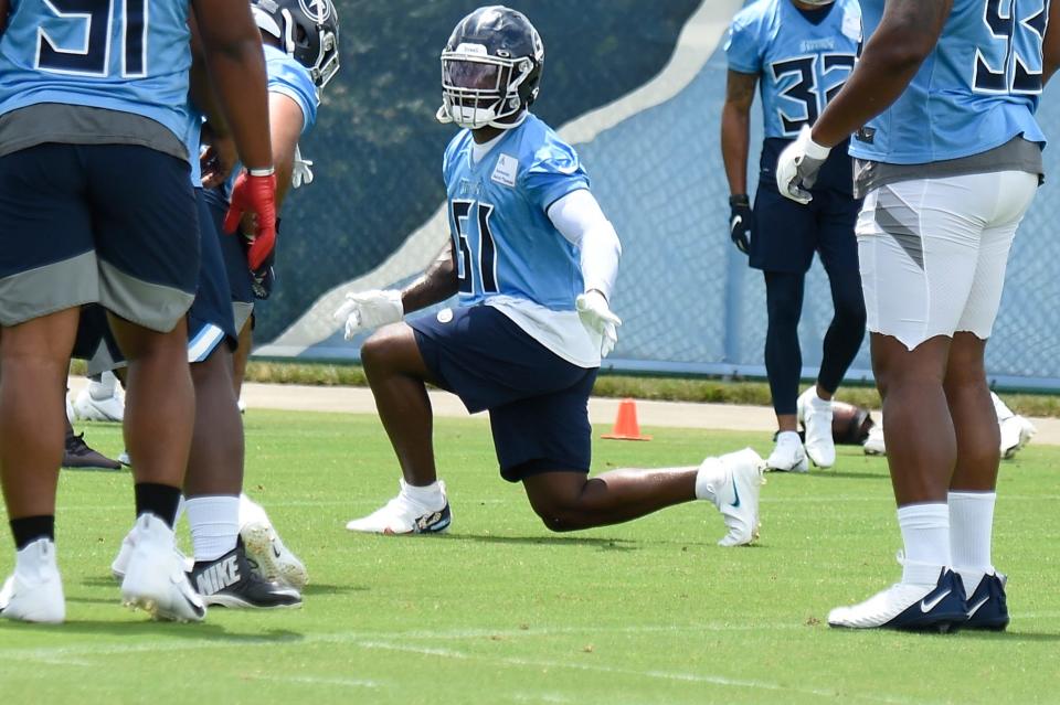 Titans linebacker David Long Jr. (51) warms up with teammates during practice at Saint Thomas Sports Park Thursday, May 27, 2021 in Nashville, Tenn. 