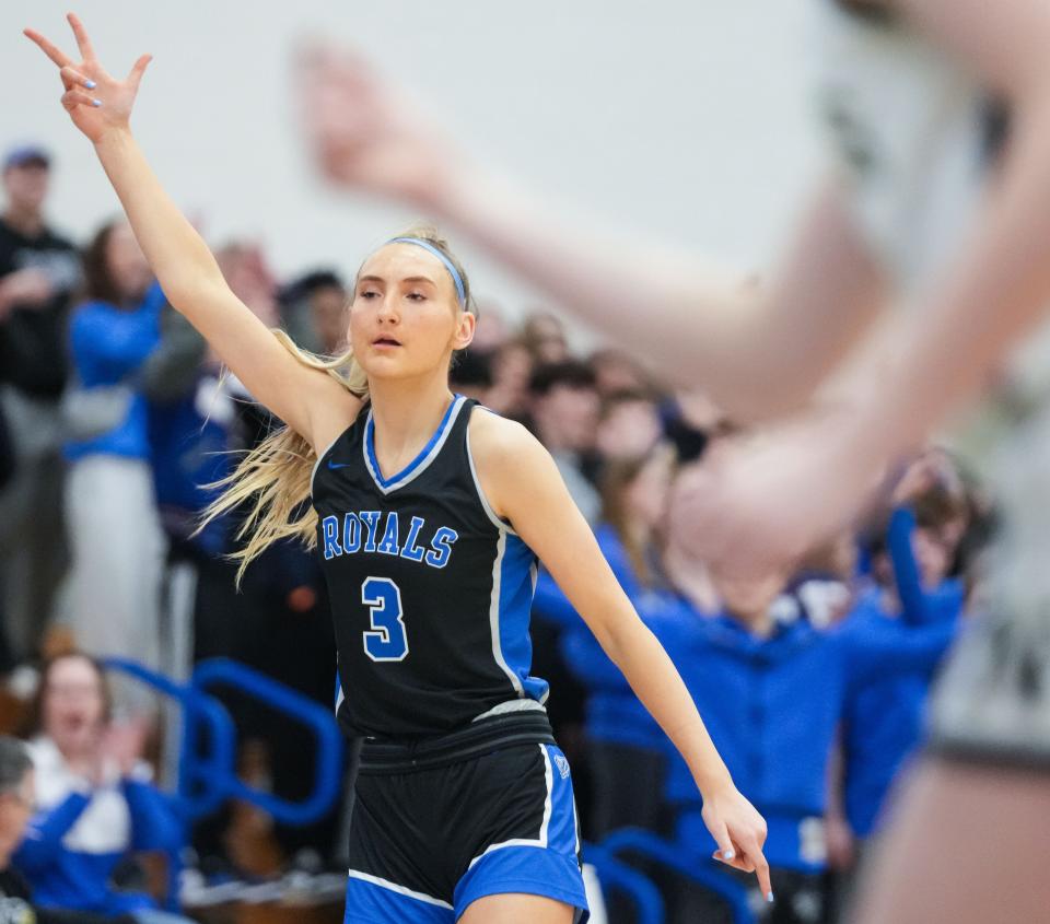 Hamilton Southeastern Royals Maya Makalusky (3) holds up three fingers after scoring a three-point basket Saturday, Feb. 3, 2024, during the IHSAA girls basketball sectional Class 4A game at Hamilton Southeastern High School in Indianapolis. The Noblesville Millers defeated the Hamilton Southeastern Royals, 49-45.