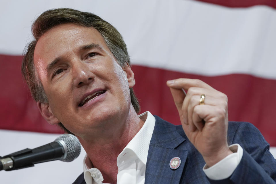 FILE - Virginia Gov. Glenn Youngkin speaks prior to signing the budget at a ceremony at a grocery store June 21, 2022, in Richmond, Va. (AP Photo/Steve Helber, File)