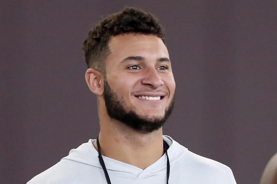 FILE - Caleb Farley smiles during Virginia Tech NFL football pro day in Blacksburg, Va., in this Friday, March 26, 2021, file photo. Farley is a possible first round pick in the NFL Draft, April 19-May 1, 2021, in Cleveland. (AP Photo/Matt Gentry, File)