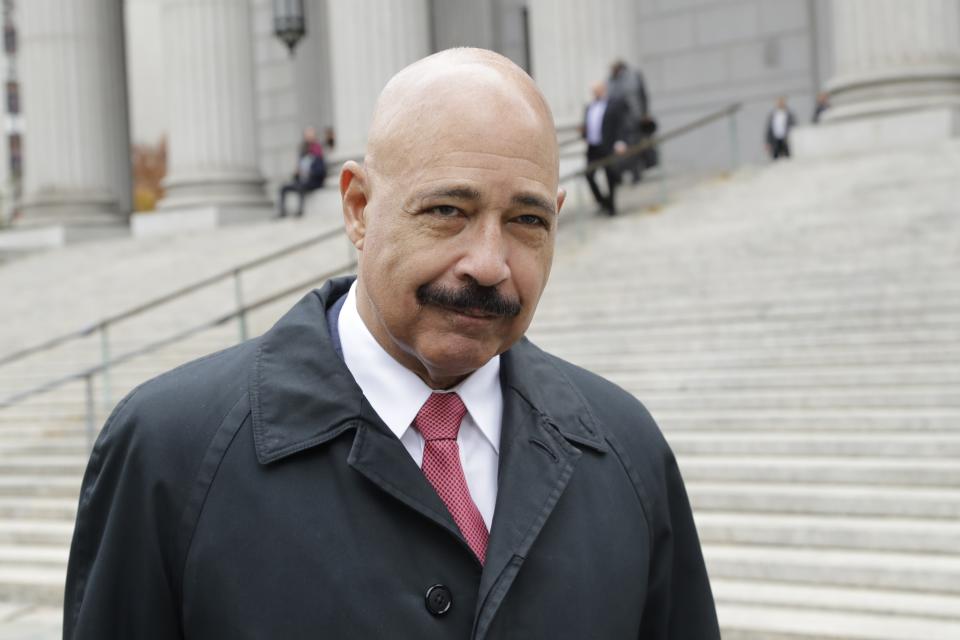 Ted Wells, Jr., the lead attorney for Exxon, leaves Manhattan Supreme court Thursday, Nov. 7, 2019, in New York. New York's attorney general is accusing Exxon Mobil of misleading investors about how profitable the company will remain as governments impose stricter regulations to combat global warming. (AP Photo/Frank Franklin II)