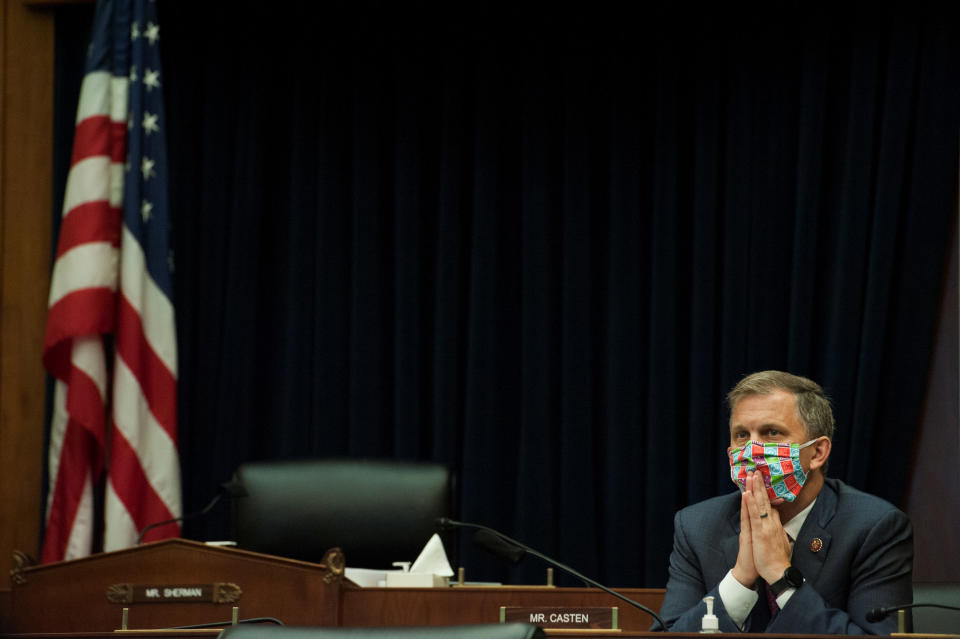 Rep. Sean Casten, D-Ill, listens as  U.S. Securities and Exchange Commission Chairman Jay Clayton, testifies before a House Committee on Financial Services hearing entitled 