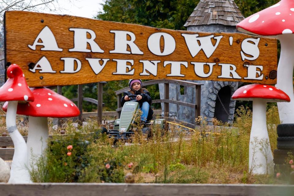 Kaia Aguilar, 8, from Laguna Hills pedals a car on Arrow's Adventure track.