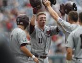 Jun 19, 2018; Omaha, NE, USA; Mississippi State Bulldogs designated hitter Jordan Westburg (11) celebrates after hitting a grand slam home run against North Carolina Tar Heels in the second inning in the College World Series at TD Ameritrade Park. Mandatory Credit: Bruce Thorson-USA TODAY Sports