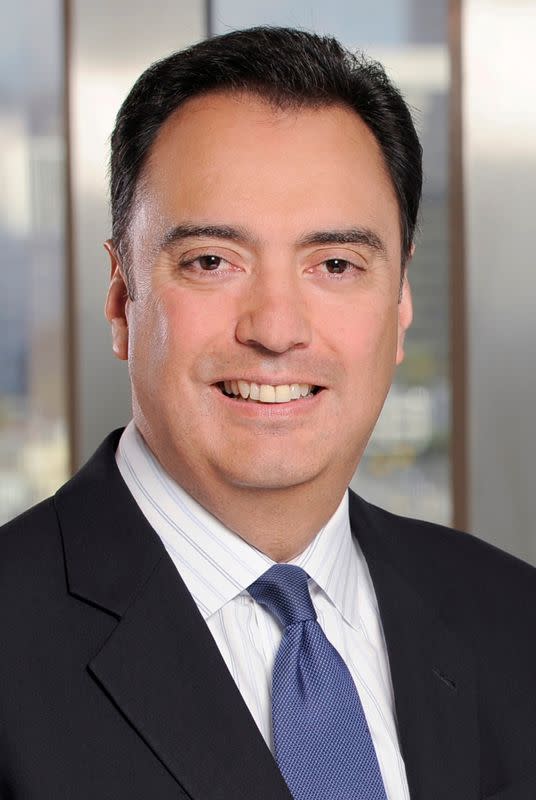 FILE PHOTO: Michael Camunez, a director of Edison International, poses in an undated photograph