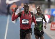 Jun 21, 2018; Des Moines, IA, USA; Lopez Lomong defeats Shadrack Kipchirchir to win the 10,000m, 28:58.38 to 28:59.67 during the USA Championships at Drake Stadium. Kirby Lee-USA TODAY Sports