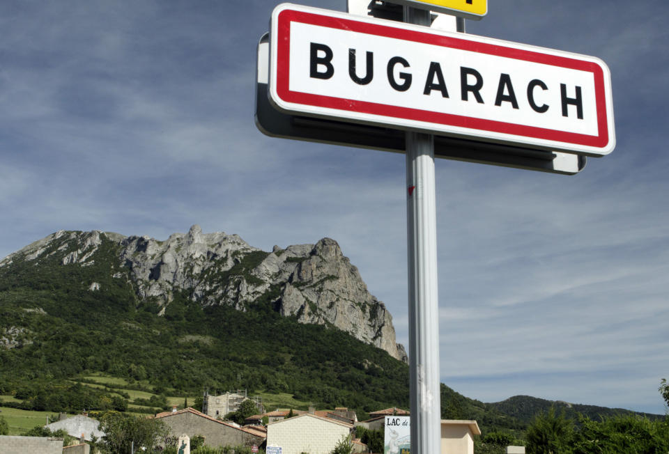 This June 24, 2011 photo shows the Bugarach mountain peak in southern France. From Russia to California, thousands are preparing for the fateful day, when many believe a 5,125-year cycle known as the Long Count in the Mayan calendar supposedly comes to an end. The Internet has helped feed the frenzy, spreading rumors that a mountain in the French Pyrenees is hiding an alien spaceship that will be the sole escape from the destruction. French authorities are blocking access to Bugarach peak from Dec. 19-23 except for the village's 200 residents "who want to live in peace," the local prefect said in a news release. (AP Photo)