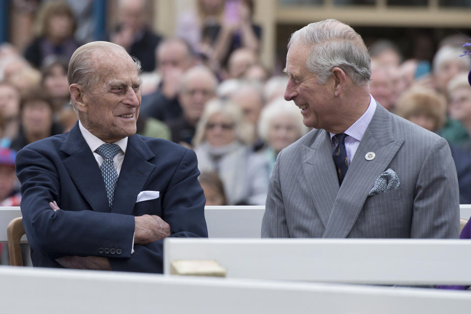 POUNDBURY, ENGLAND - OCTOBER 27: Britain&#39;s Prince Philip, Duke of Edinburgh (L) and Prince Charles, Prince of Wales (R) listen to speeches before a statue of the Queen Elizabeth, The Queen Mother was unveiled on October 27, 2016 in Poundbury, England.
The Queen and The Duke of Edinburgh, accompanied by The Prince of Wales and The Duchess of Cornwall, visited Poundbury. Poundbury is an experimental new town on the outskirts of Dorchester in southwest England designed by Leon Krier with traditional urban principles championed by The Prince of Wales and built on land owned by the Duchy of Cornwall.(Photo by Justin Tallis - WPA Pool/Getty Images)