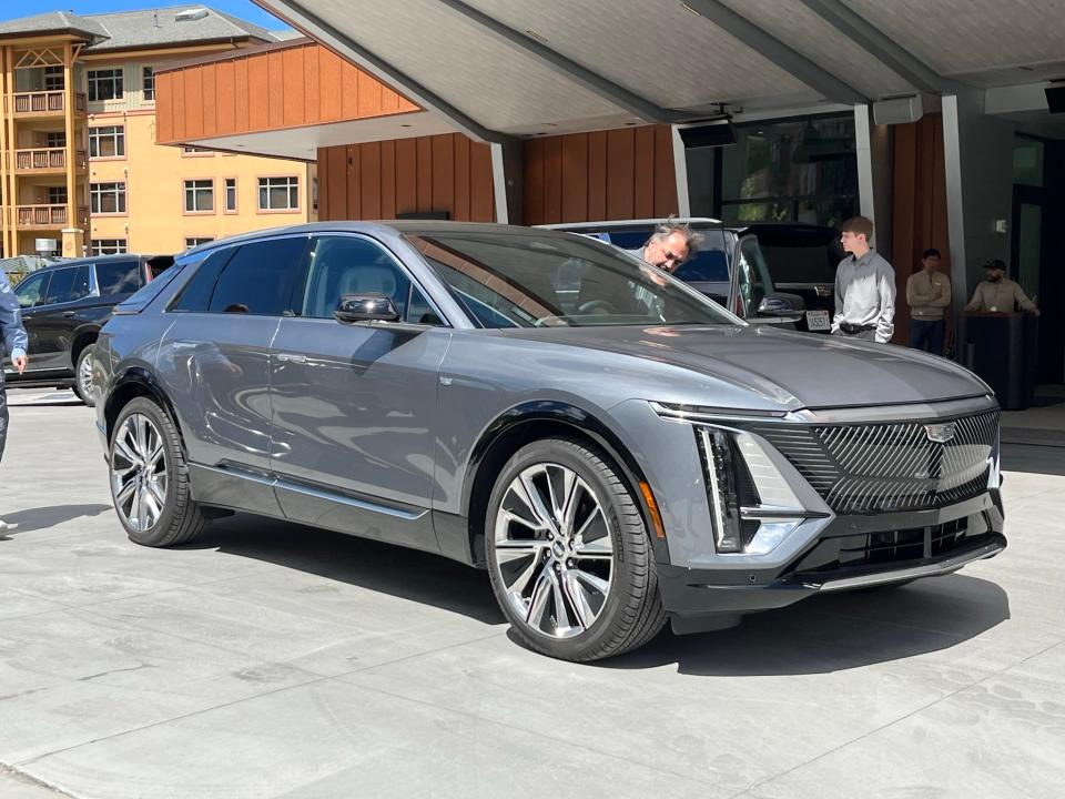 The 2023 Cadillac Lyriq electric SUV's innovative slimline vertical LED lights, lighted grille panel and Cadillac badge make it uniquely identifiable, especially at night.