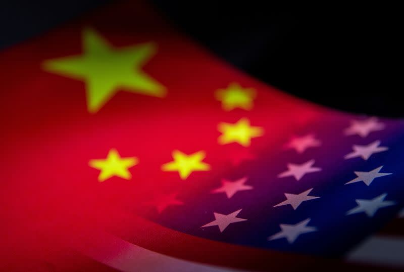 FILE PHOTO: Illustration shows China and U.S. flags