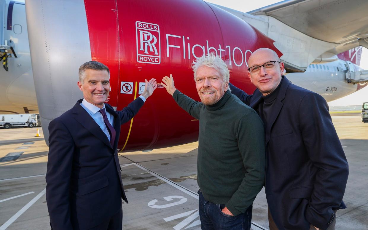 Virgin Atlantic has launched the world's first 100% Sustainable Aviation Fuel (SAF) transatlantic flight. Pictured are Sir Richard Branson (centre), Shai Weiss, Chief Executive Officer at Virgin Atlantic (right) and Rt Hon Mark Harper MP, Secretary of State for Transport.