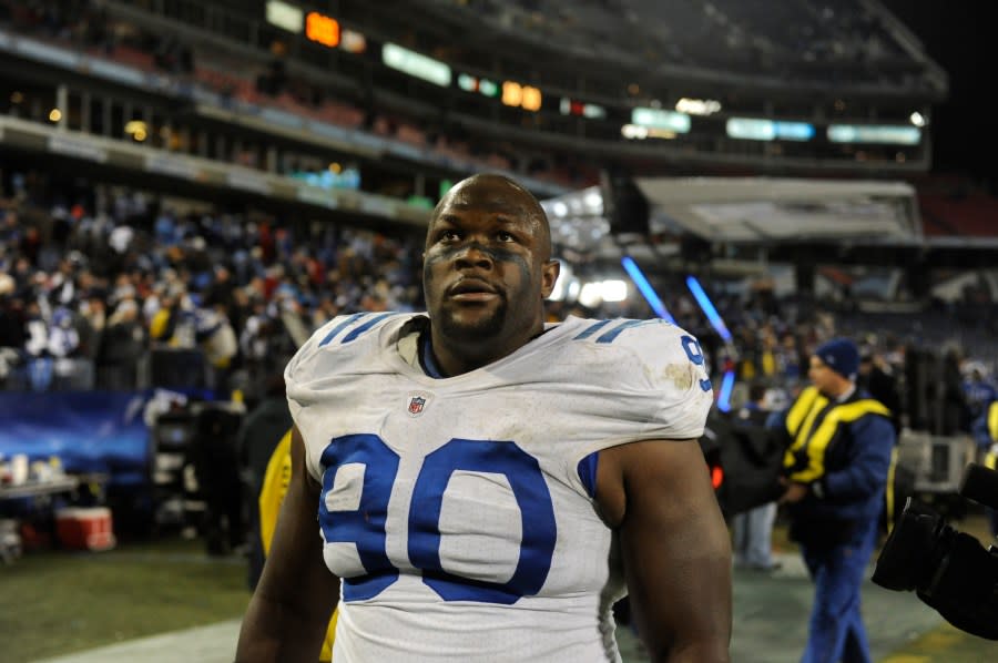 Indianapolis Colts defensive tackle Daniel Muir (90) leaves the field after the Colts beat the Tennessee Titans 30-28 in an NFL football game on Thursday, Dec. 9, 2010, in Nashville, Tenn. (AP Photo/Joe Howell)