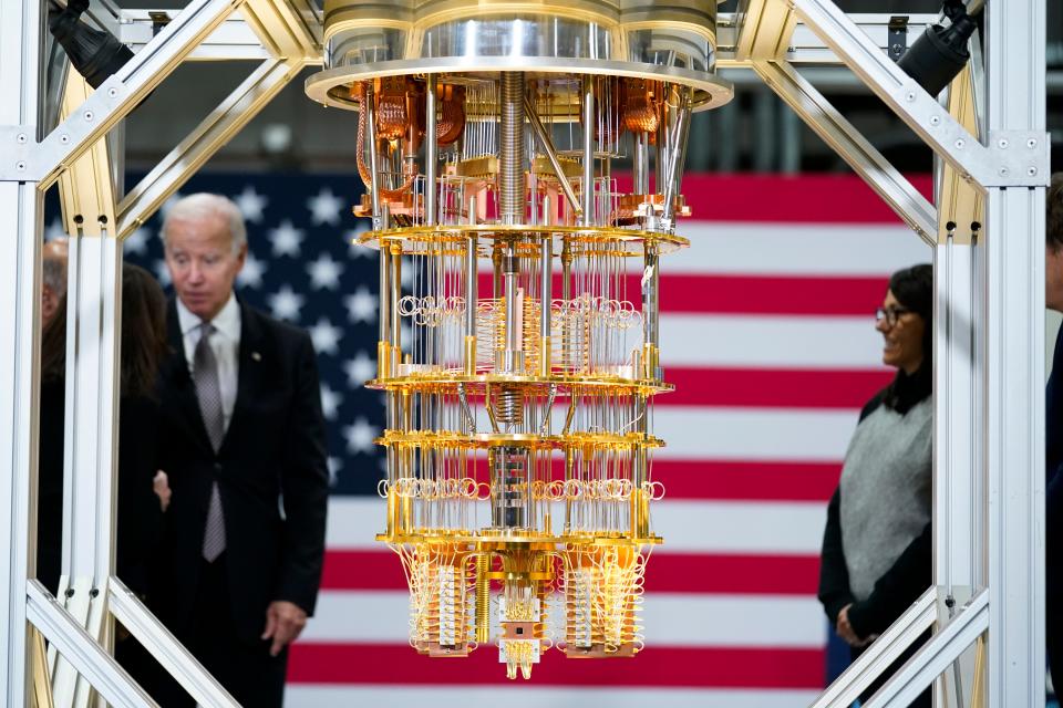 President Joe Biden tours an IBM facility in 2022. Last year, IBM announced a return to a defined benefit plan akin to a traditional pension.