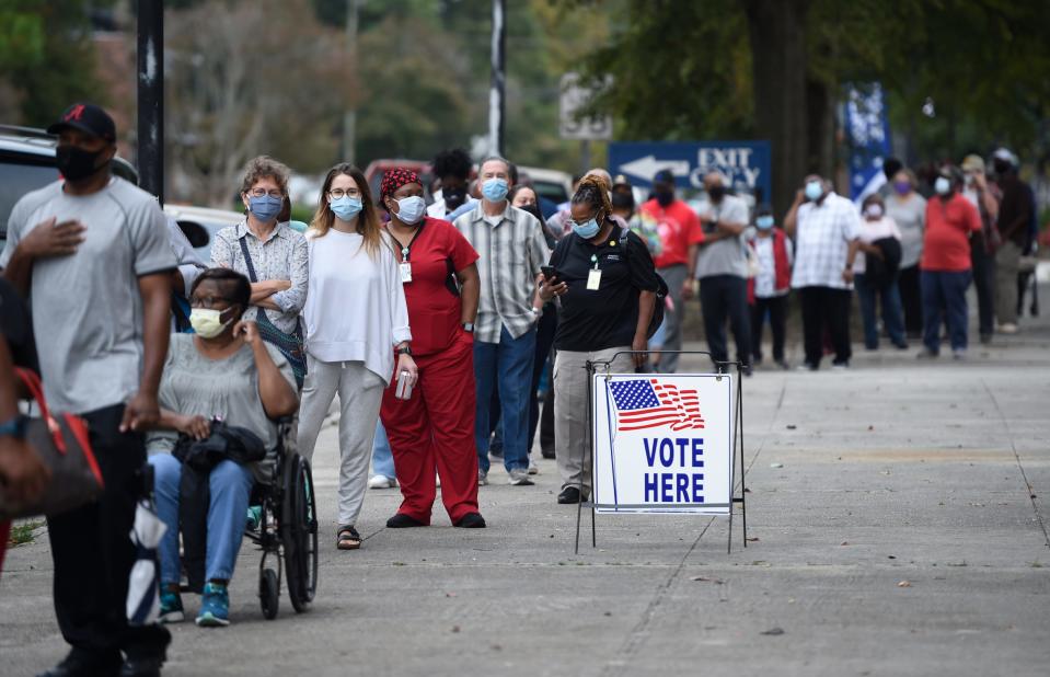 Oct. 12 was the first day for advance voting in Georgia, and people showed up by the hundreds to cast their ballot early at the Bell Auditorium in Augusta.