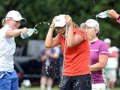 Rivals shower Lydia Ko with water after her victory in the 2013 Canadian Women's Open.