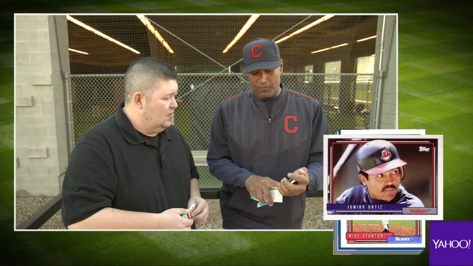 Sandy Alomar Jr. opening 25-year-old baseball cards. (Yahoo Sports)